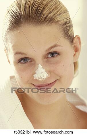 Woman's with cream on her nose View Large Photo Image Stock Image - Woman's with cream on her nose. Fotosearch
