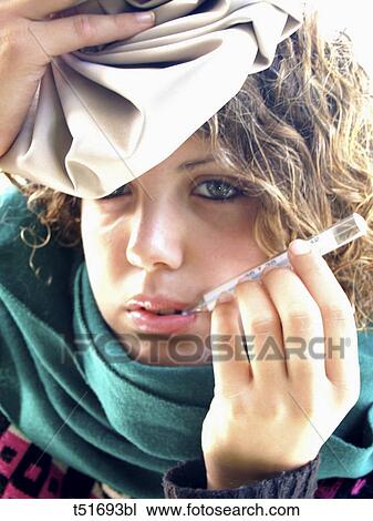 Stock Image - Young woman feeling sick. Fotosearch