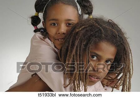 Stock Image - African boy and girl . Fotosearch