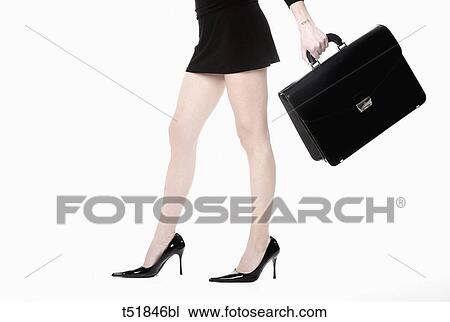 Businesswoman with briefcase View Large Photo Image Stock Image - Businesswoman with briefcase . Fotosearch