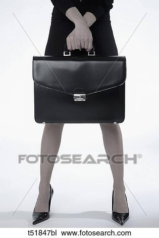 Businesswoman with briefcase View Large Photo Image Stock Image - Businesswoman with briefcase . Fotosearch