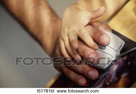 Child and adult operating mouse View Large Photo Image Stock Image - Child and adult operating mouse . Fotosearch