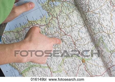 close-up of hand pointing at roadmap View Large Photo Image Stock Image - close-up of hand pointing at roadmap. Fotosearch