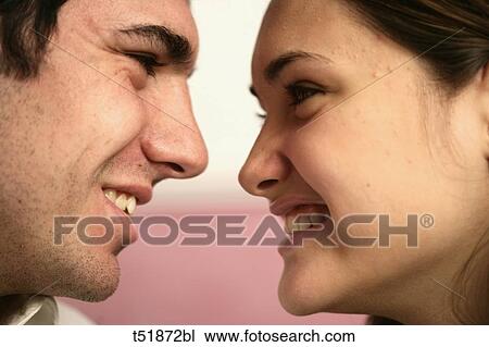 Couple smiling at each other View Large Photo Image Stock Image - Couple smiling at each other . Fotosearch