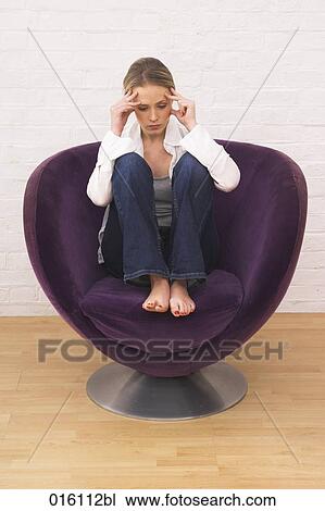 full body portrait of young woman sitting purple chair looking depressed View Large Photo Image Stock Image - full body portrait of young woman sitting purple chair looking depressed. Fotosearch
