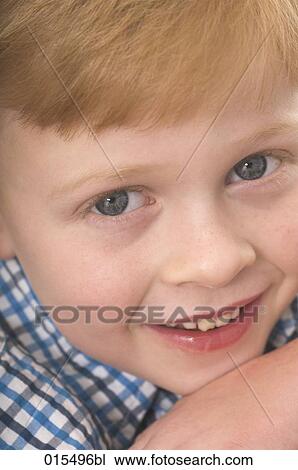headshot of friendly red haired boy looking at camera View Large Photo Image Stock Image - headshot of friendly red haired boy looking at camera. Fotosearch