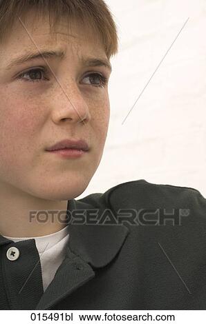 headshot of sad young boy View Large Photo Image Stock Image - headshot of sad young boy. Fotosearch