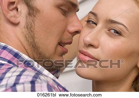 headshot of young couple woman looking at camera View Large Photo Image Stock Image - headshot of young couple woman looking at camera . Fotosearch