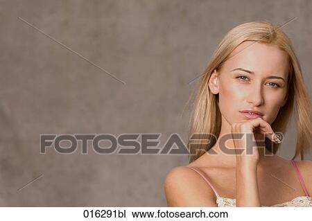 headshot of young woman with long blond hair View Large Photo Image Stock Image - headshot of young woman with long blond hair. Fotosearch