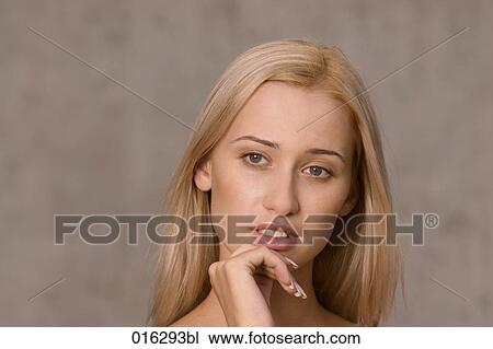 headshot of young woman with long blond hair View Large Photo Image Stock Image - headshot of young woman with long blond hair. Fotosearch