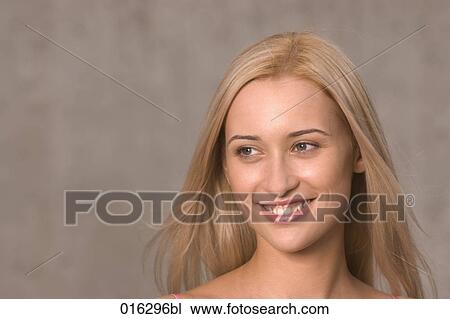 headshot of young woman with long blond hair View Large Photo Image Stock Image - headshot of young woman with long blond hair. Fotosearch