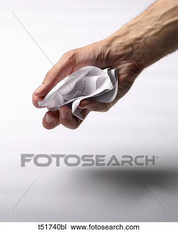 Holding crumpled paper View Large Photo Image Stock Image - Holding crumpled paper . Fotosearch