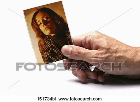 Holding photo View Large Photo Image Stock Image - Holding photo . Fotosearch