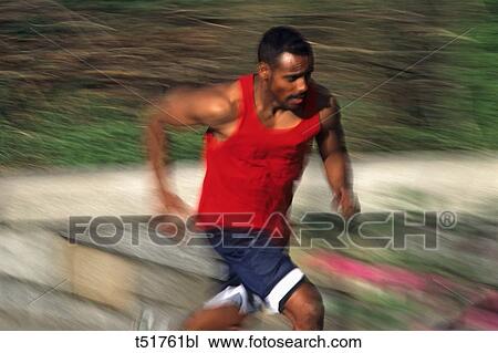 Stock Image - Male runner training . Fotosearch