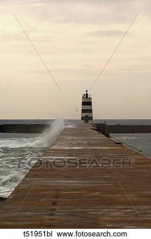 Pier and lighthouse View Large Photo Image Stock Image - Pier and lighthouse . Fotosearch