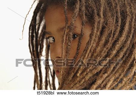 Stock Image - Portrait of african boy . Fotosearch