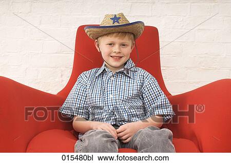 portrait of little boy wearing cowboy hat View Large Photo Image Stock Image - portrait of little boy wearing cowboy hat. Fotosearch