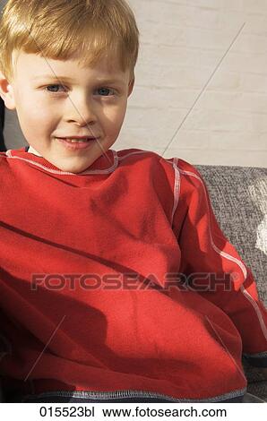 portrait of young boy wearing red jumper View Large Photo Image Stock Image - portrait of young boy wearing red jumper. Fotosearch