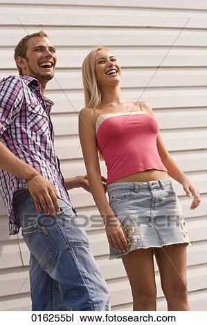 portrait of young couple sharing a laugh View Large Photo Image Stock Image - portrait of young couple sharing a laugh. Fotosearch