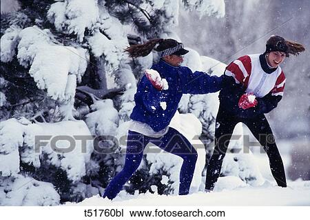 Snow ball fight View Large Photo Image Stock Image - Snow ball fight . Fotosearch