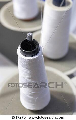 Spools of thread View Large Photo Image Stock Image - Spools of thread . Fotosearch