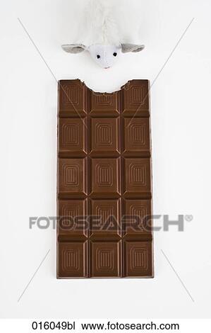still life of bitten chocolate bar with cuddly toy View Large Photo Image Stock Image - still life of bitten chocolate bar with cuddly toy. Fotosearch