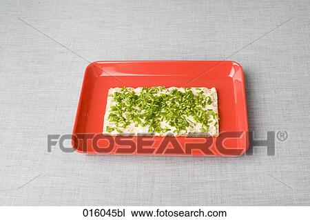 still life of crisp bread with cress on red plate View Large Photo Image Stock Image - still life of crisp bread with cress on red plate. Fotosearch