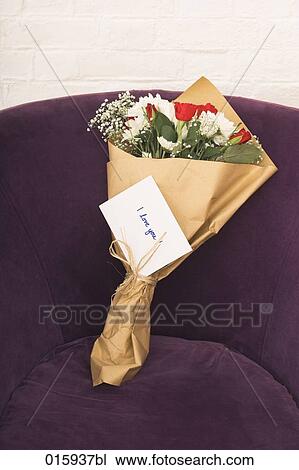 still life of flower bouquet on arm chair with english note i love you View Large Photo Image Stock Image - still life of flower bouquet on arm chair with english note i love you. Fotosearch