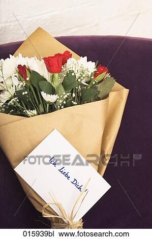 still life of flower bouquet on arm chair with german note ich liebe dich View Large Photo Image Stock Image - still life of flower bouquet on arm chair with german note ich liebe dich. Fotosearch