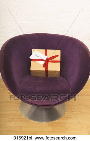 still life of present on purple arm chair with german note ich liebe dich View Large Photo Image Stock Image - still life of present on purple arm chair with german note ich liebe dich. Fotosearch