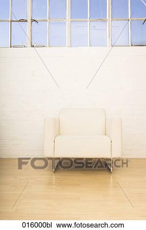 still life of single white arm chair View Large Photo Image Stock Image - still life of single white arm chair. Fotosearch