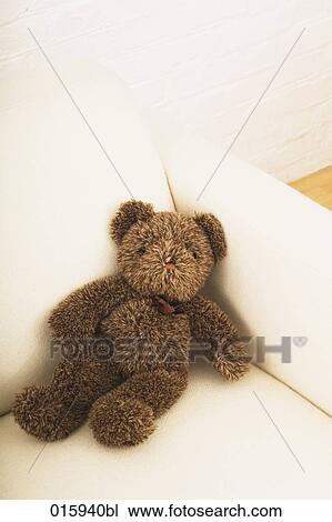 still life of teddy bear on white arm chair View Large Photo Image Stock Image - still life of teddy bear on white arm chair. Fotosearch
