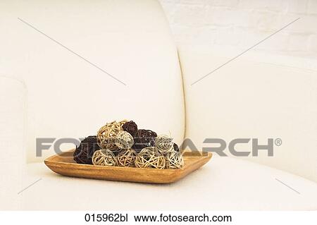 still life of wool on tray on white arm chair View Large Photo Image Stock Image - still life of wool on tray on white arm chair. Fotosearch