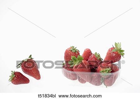 Strawberries in plastic container, close-up View Large Photo Image Stock Image - Strawberries in plastic container, close-up . Fotosearch