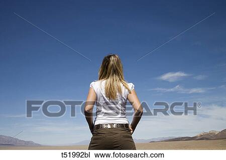 USA, California, Death Valley National Park, woman looking View Large Photo Image Stock Image - USA, California, Death Valley National Park, woman looking . Fotosearch