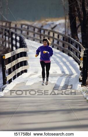 Woman jogging View Large Photo Image Stock Image - Woman jogging . Fotosearch