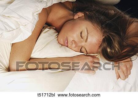 Woman sleeping View Large Photo Image Stock Image - Woman sleeping . Fotosearch