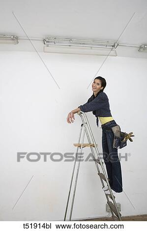Woman Standing On Ladder View Large Photo Image Stock Image - Woman Standing On Ladder . Fotosearch