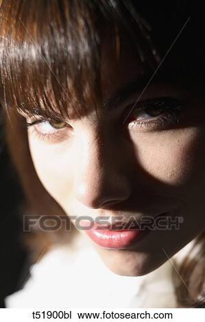 Young woman, portrait, close up View Large Photo Image Stock Image - Young woman, portrait, close up . Fotosearch