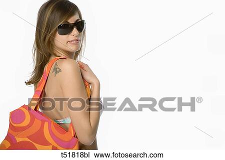 Young woman with beach gear View Large Photo Image Stock Image - Young woman with beach gear . Fotosearch