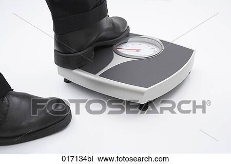 detail of person stepping on scales View Large Photo Image Stock Image - detail of person stepping on scales. Fotosearch