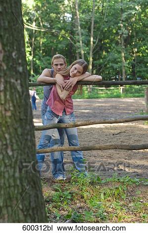 full body portrait of young couple outdoors View Large Photo Image Stock Image - full body portrait of young couple outdoors. Fotosearch