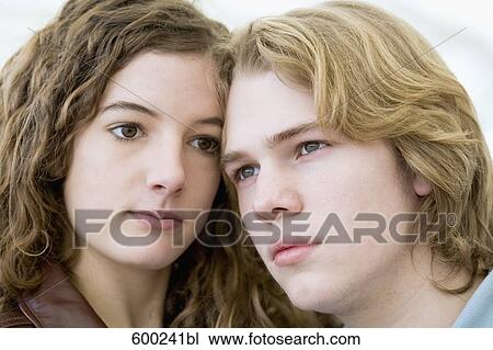 headshot of sad teenage couple View Large Photo Image Stock Image - headshot of sad teenage couple. Fotosearch