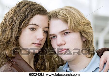 headshot of sad teenage couple View Large Photo Image Stock Image - headshot of sad teenage couple. Fotosearch