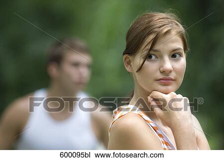 headshot of wistful looking young woman View Large Photo Image Stock Image - headshot of wistful looking young woman. Fotosearch