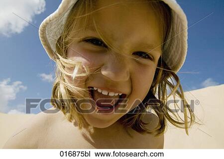 headshot of young girl laughing at camera View Large Photo Image Stock Image - headshot of young girl laughing at camera . Fotosearch