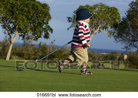 little boy running over golf course View Large Photo Image Stock Image - little boy running over golf course. Fotosearch