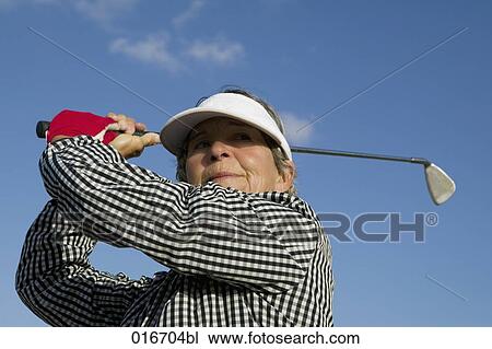 portrait of female mature golf player View Large Photo Image Stock Image - portrait of female mature golf player. Fotosearch
