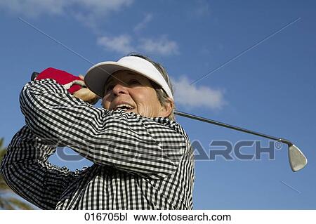 portrait of female mature golf player View Large Photo Image Stock Image - portrait of female mature golf player. Fotosearch