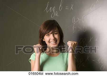 portrait of happy female student in front of blackboard View Large Photo Image Stock Image - portrait of happy female student in front of blackboard. Fotosearch